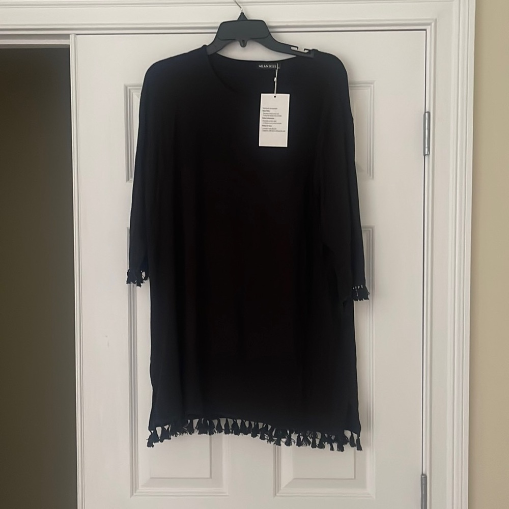 New with tags cute black dress with tassel hem and sleeves